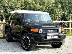 Black with white roof Used 2012 Toyota FJ Cruiser SUV | £24,950 (Fair price)