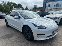 White Used 2020 Tesla Model 3 Standard Range Sedan | £11,990 (A bit pricey)