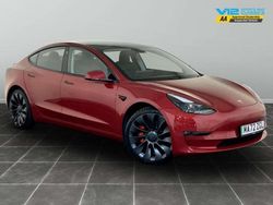 Red Used 2022 Tesla Model 3 Performance Sedan | £25,795 (A bit pricey)