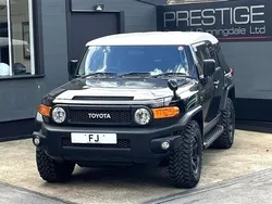 Black with white roof Used 2016 Toyota FJ Cruiser SUV | £29,950 (A bit pricey)