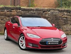 Red Used 2015 Tesla Model S Sedan | £13,495 (A bit pricey)