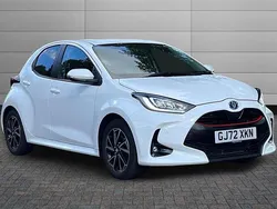 Pure white Used 2022 Toyota Yaris Hybrid Design Hatchback | £18,195 (Fair price)