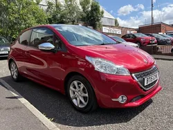 Red Used 2015 Peugeot 208 Style Hatchback | £6,495 (A bit pricey)