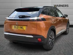 Orange Used 2021 Peugeot e-2008 Premium SUV | £13,995 (A bit pricey)