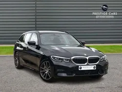 Black Used 2021 BMW 330e Sport Line Estate | £18,991 (Fair price)