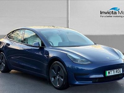 Deep blue metallic Used 2021 Tesla Model 3 Standard Range Sedan | £18,500 (Fair price)