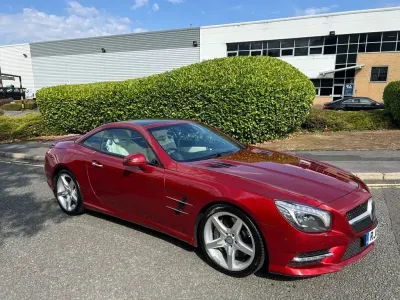 Used Mercedes SL500 AMG 448 HP (329 kW) 2015 Hyacinth red metallic Cabriolet
