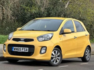 Used Kia Picanto 68 HP (50 kW) 2015 Yellow Hatchback