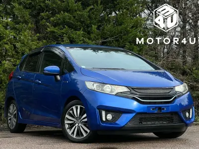 Second-hand Honda Jazz Hybrid 130 CP (95 kW) 2014 Albastru Hatchback