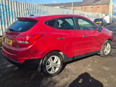 Usado Hyundai ix35 Premium 115 HP (84 kW) 2011 Vermelho SUV