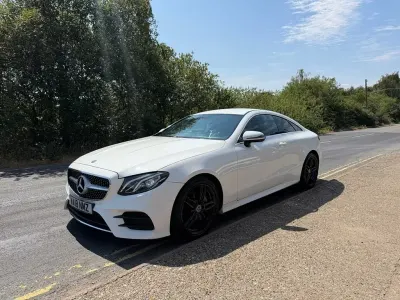 Used Mercedes E220 AMG line 194 HP (142 kW) 2018 White Coupe