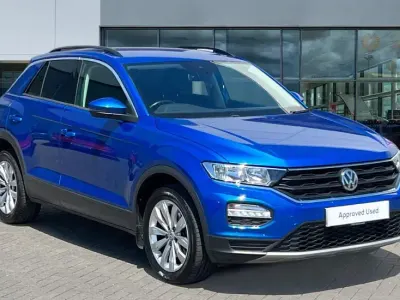 Used VW T-Roc SE 150 HP (110 kW) 2019 Ravenna blue metallic SUV