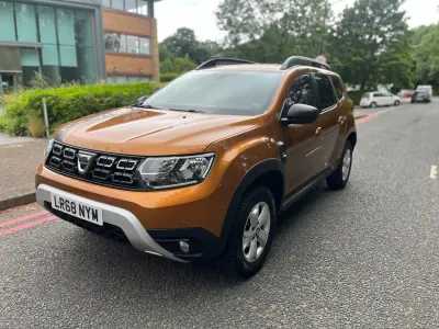 Second-hand Dacia Duster 115 CP (84 kW) 2018 Portocaliu SUV