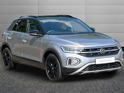 Used VW T-Roc Style 110 HP (80 kW) 2023 Pyrite silver with black roof SUV