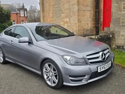 Used Mercedes C180 AMG 156 HP (114 kW) 2012 Silver Coupe