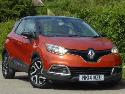 Used Renault Captur Dynamique 90 HP (66 kW) 2014 Orange black SUV