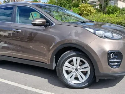 Używany Kia Sportage 130 KM (95 kW) 2018 Brązowy SUV