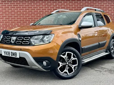 Used Dacia Duster Prestige 114 HP (83 kW) 2018 Orange SUV