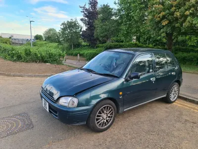 Used Toyota Starlet 75 HP (55 kW) 1998 Green Hatchback
