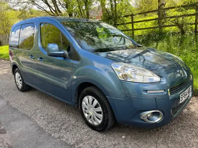 Używany Peugeot Partner Tepee S 92 KM (67 kW) 2015 Niebieski Minivan