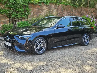 Used Mercedes C200 AMG line 204 HP (150 kW) 2022 Black Estate
