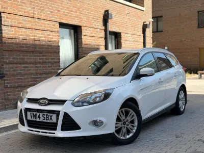 Begagnad Ford Focus Titanium 125 HK (91 kW) 2014 Vit Kombi