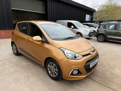 Używany Hyundai i10 Premium 83 KM (61 kW) 2015 Pomarańczowy Hatchback