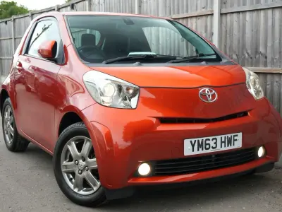 Used Toyota iQ 68 HP (50 kW) 2014 Orange Hatchback