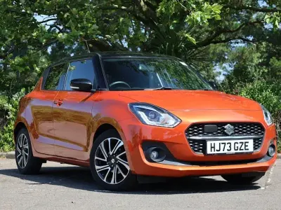 Used Suzuki Swift SZ5 83 HP (61 kW) 2023 Metallic  flame orange/super black Hatchback