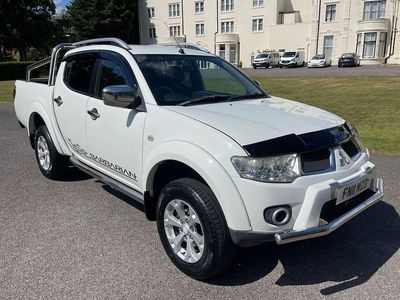 White Used 2011 Mitsubishi L200 Pickup | £7,995 (A bit pricey)