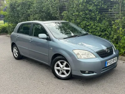 Usado Toyota Corolla 2003 Cinzento Citadino