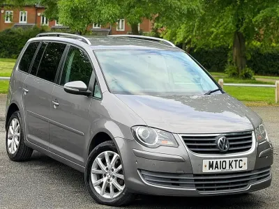 Usado VW Touran Match 90 HP (66 kW) 2010 Cinzento Monovolume