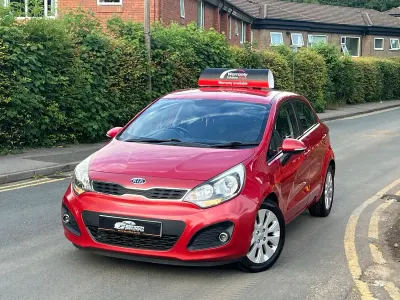 Used Kia Rio 85 HP (62 kW) 2011 Red Hatchback