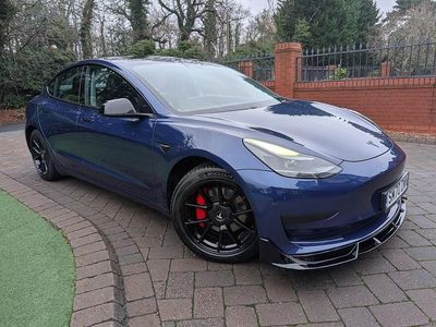 Deep blue Used 2020 Tesla Model 3 Standard Range Sedan | £12,975 (A bit pricey)