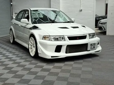 Used Mitsubishi Lancer 280 HP (205 kW) 2001 White Sedan