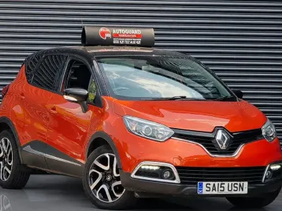 Used Renault Captur Dynamique 90 HP (66 kW) 2015 Orange/black SUV