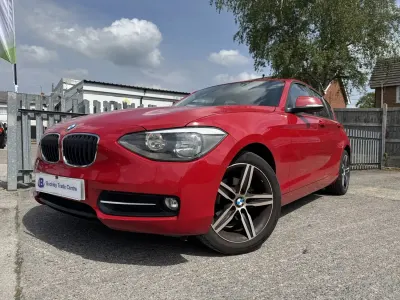 Usado BMW 116 Sport Line 2014 Rojo Utilitario