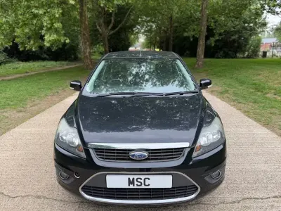 Używany Ford Focus Titanium 100 KM (73 kW) 2010 Czarny Hatchback