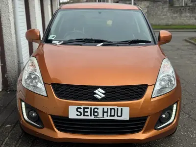 Usado Suzuki Swift SZ-L 94 CV (69 kW) 2016 Naranja Utilitario