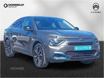 Używany Citroën e-C4 Shine 100 kW (136 KM) 2023 Szary Sedan/Limuzyna