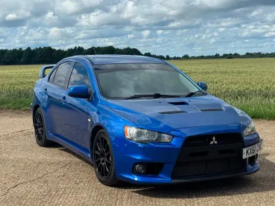 Used Mitsubishi Lancer 240 HP (176 kW) 2011 Blue Sedan