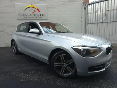 Begagnad BMW 116 Sport Line 2014 Silver Halvkombi