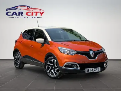 Used Renault Captur Dynamique 90 HP (66 kW) 2014 Orange/cream SUV