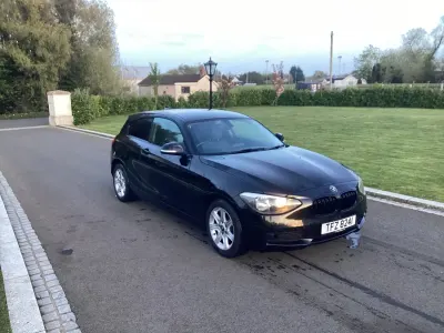 Usado BMW 114 2014 Negro Utilitario
