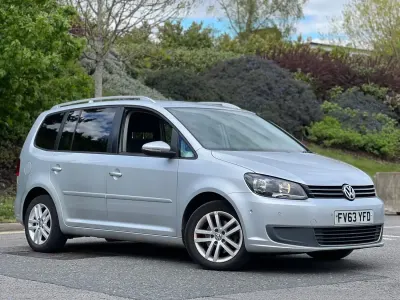 Używany VW Touran SE 105 KM (77 kW) 2013 Srebrny Minivan