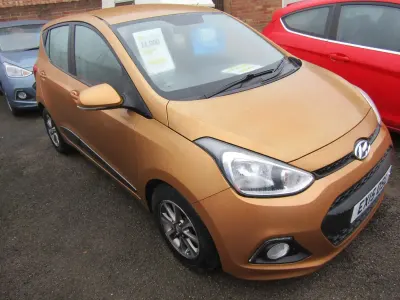 Käytetty Hyundai i10 Premium 87 HP (63 kW) 2015 Oranssi Viistoperä