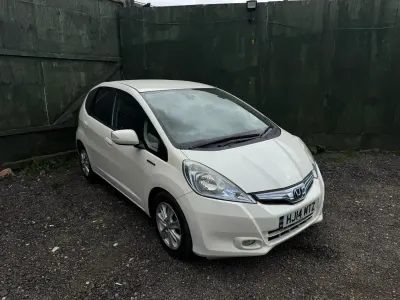 Second-hand Honda Jazz Hybrid 102 CP (75 kW) 2014 Alb Hatchback
