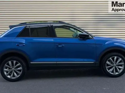 Used VW T-Roc Design 115 HP (84 kW) 2018 Ravenna blue metallic black SUV