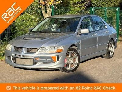 Used Mitsubishi Lancer 261 HP (191 kW) 2005 Silver Sedan