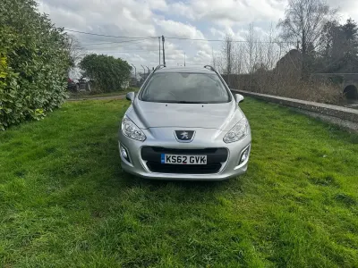Begagnad Peugeot 308 2013 Silver Kombi